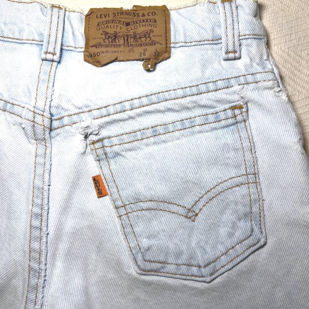 Vintage Levis 94' 550 Orange Tab Thrashed Cut Off Shorts Light Wash 26 Waist